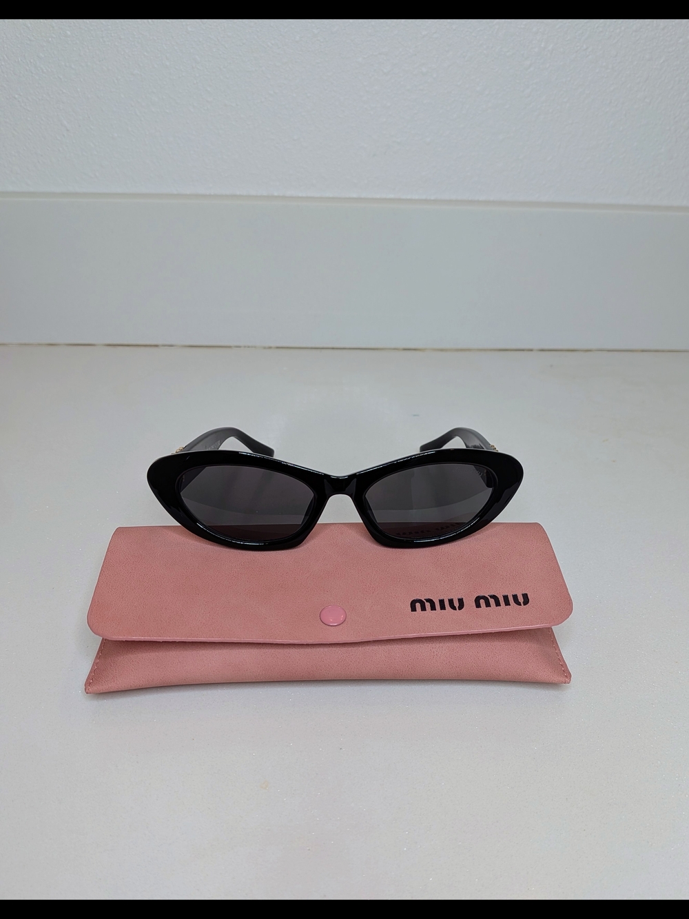 Miu Miu Women's Black Oval Cat Eye Sunglasses - Picture 8 of 13